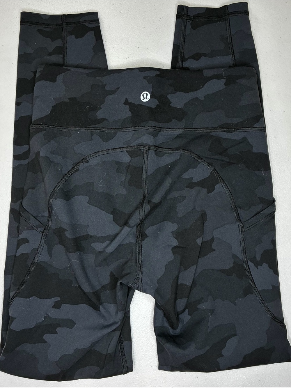Women’s Lululemon High-Rise Black Camo‎ Leggings - size 4